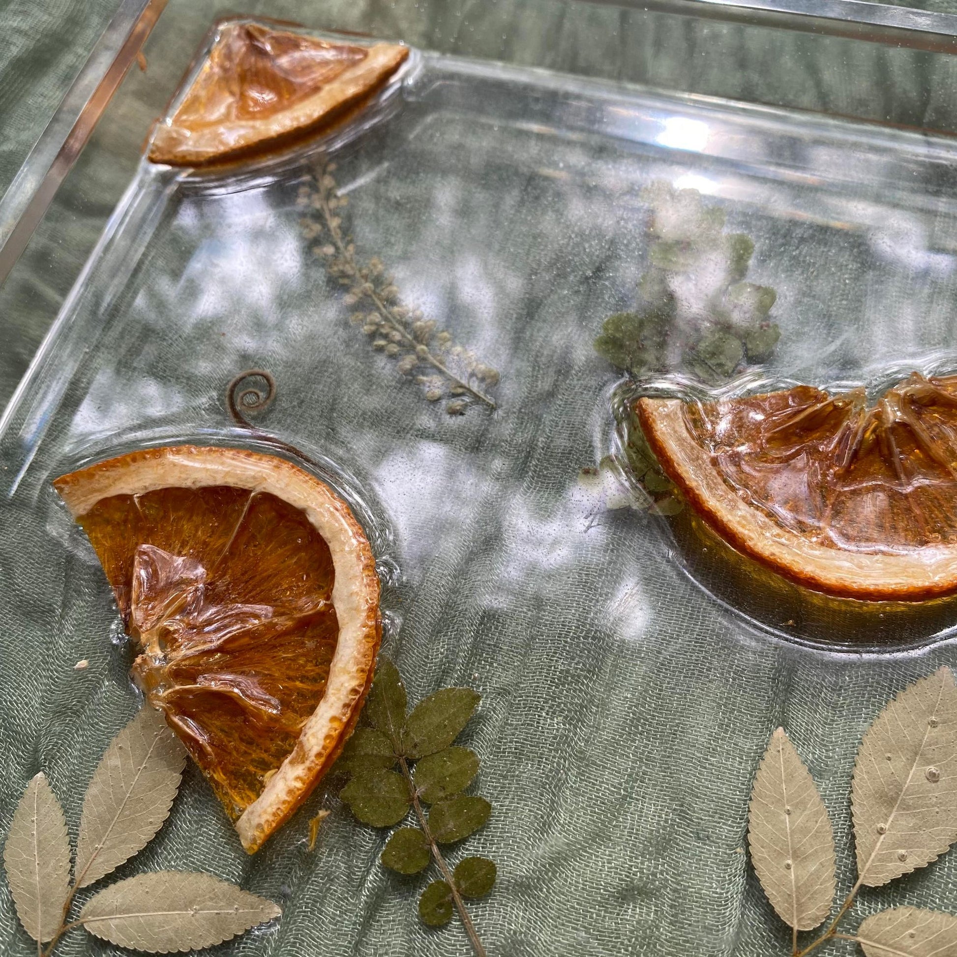 Close up of the tray to show the texture of the oranges.